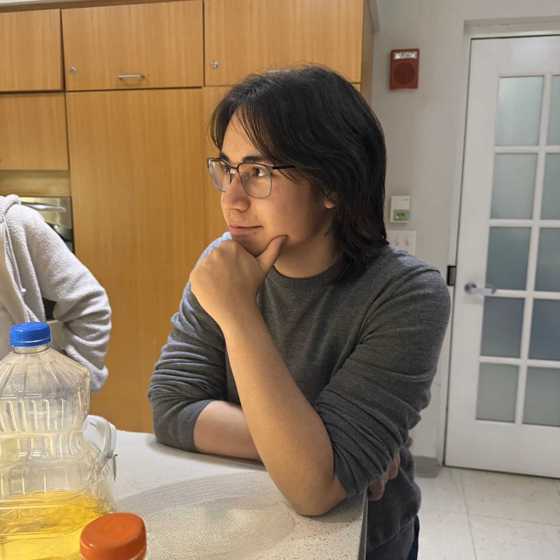 Timothy Wright seated in a Boston University laboratory setting.